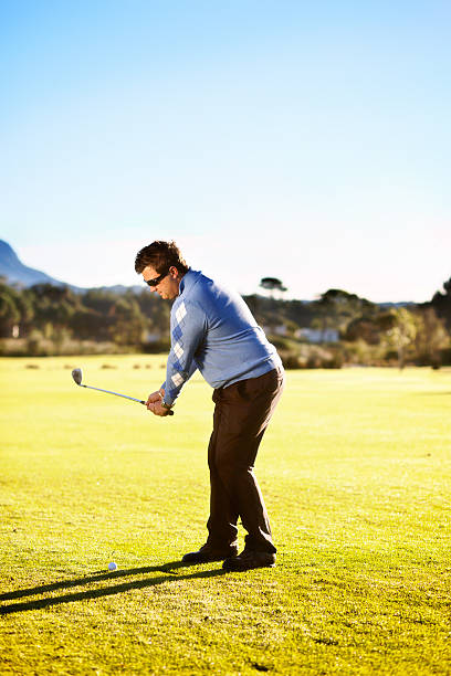 istock Young golfer begins his golf swing 503147185
