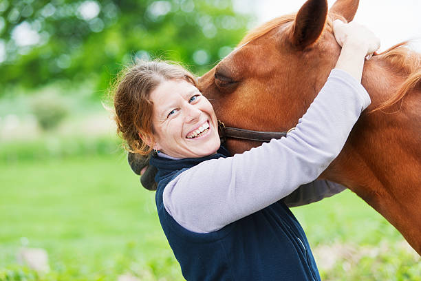 istock Female veterinarian with her horse 503148267