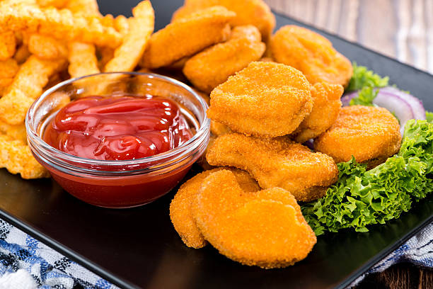 istock Chicken Nuggets with French Fries 503149547