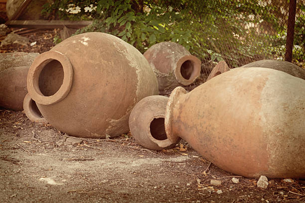 istock old clay jugs on earth, retro toning 503150053