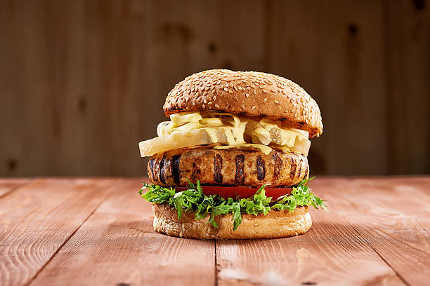 Tasty chicken burger with pineapple slices