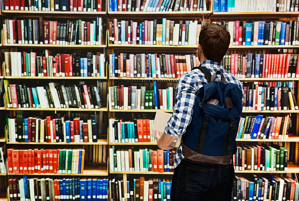 istock Rear view of student in library 503154958