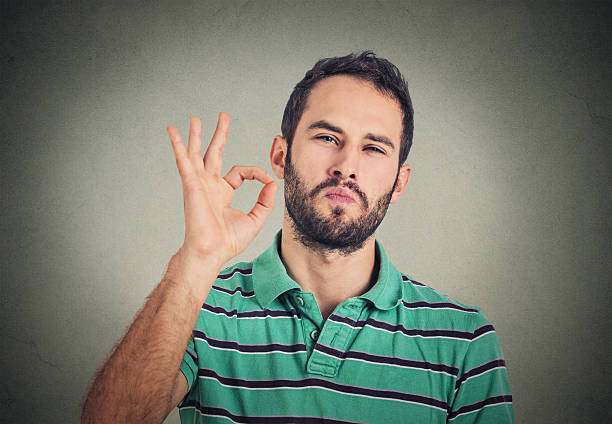 istock Everything is OK! Happy man gesturing OK sign 503155434