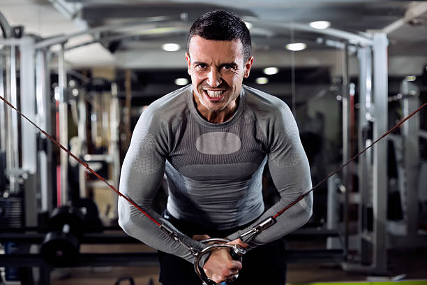 istock Man during workout in the gym 503157256