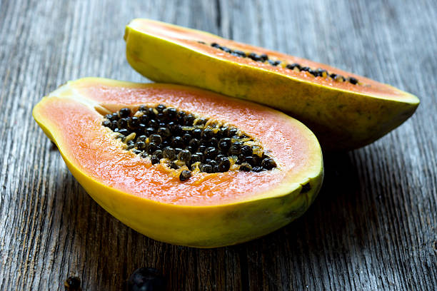 istock Papaya on wooden background 503158170