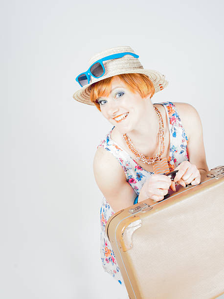 istock Young woman with suitcase in retro style 503158628