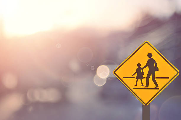 istock School sign on blur traffic road background. 503160972