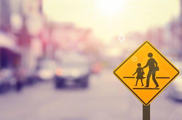 istock School sign on blur traffic road background. 503161194