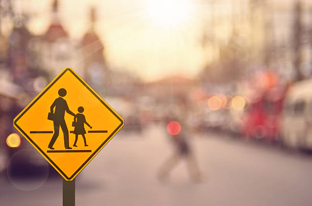 istock School sign on blur traffic road background. 503161372