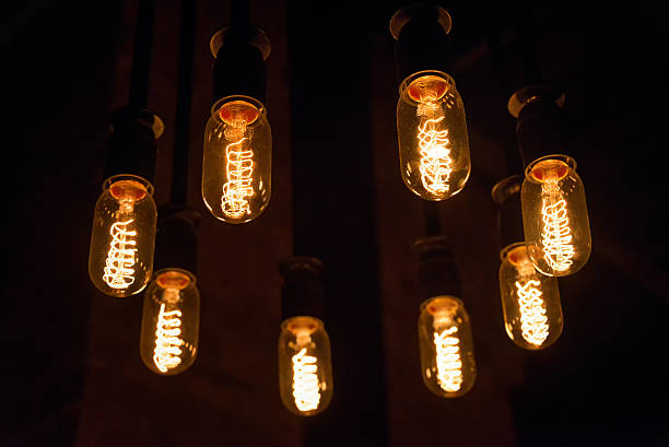 istock Decorative antique edison style light bulbs arranged in a circle 503162900