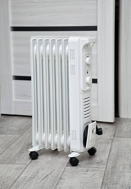 istock electric heater in the room 503165352