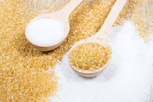 istock Brown sugar cane on the wooden background. 503166480