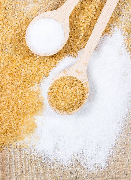 istock Brown sugar cane on the wooden background. 503166528