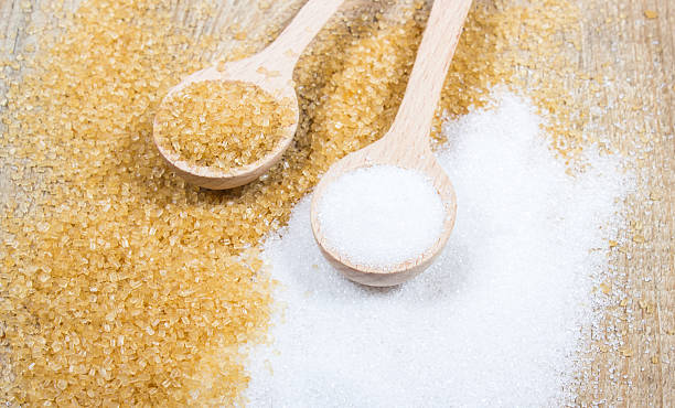istock Brown sugar cane on the wooden background. 503167296