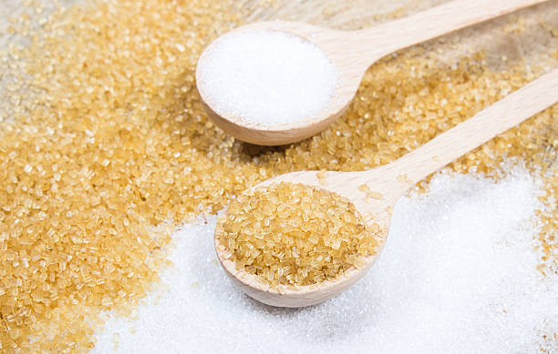 istock Brown sugar cane on the wooden background. 503167328