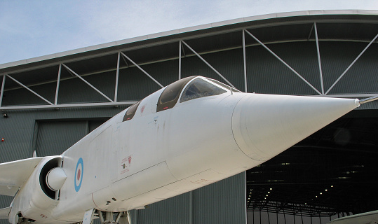 Duxford, Cambridgeshire, UK - June 18, 2006: TSR2 experimental jet bomber of the cold-war area. Showing the frontal section of the nose and starboard air intake, outside its hanger. Aircraft on permanent display to the viewing public.