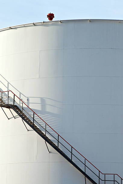 istock white tanks in tank farm with blue sky 503170460