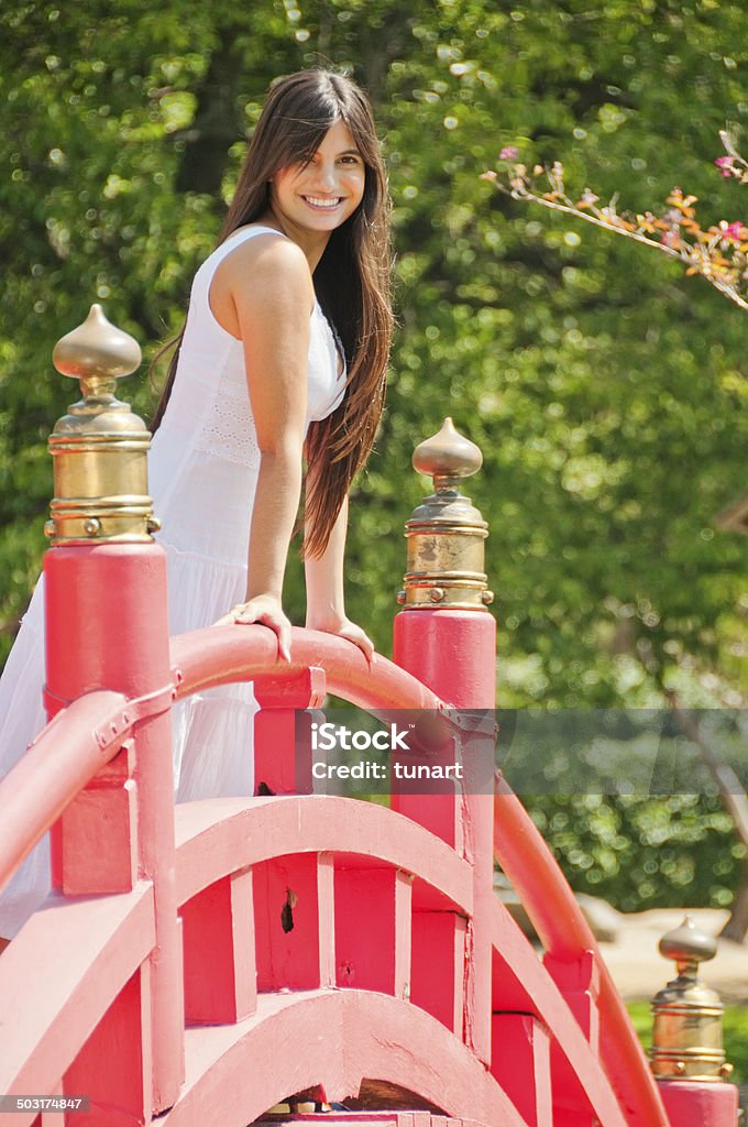 Woman on Japanese Bridge, Buenos Aires, Argentina Che'lypse 2008, Japanese Garden, Buenos Aires, Argentina 20-29 Years Stock Photo