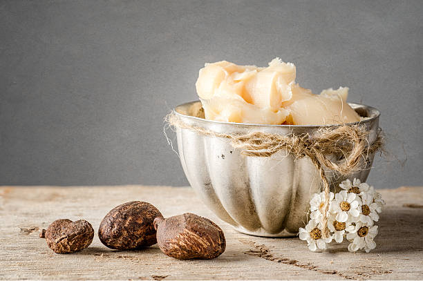Shea Butter and nuts stock photo