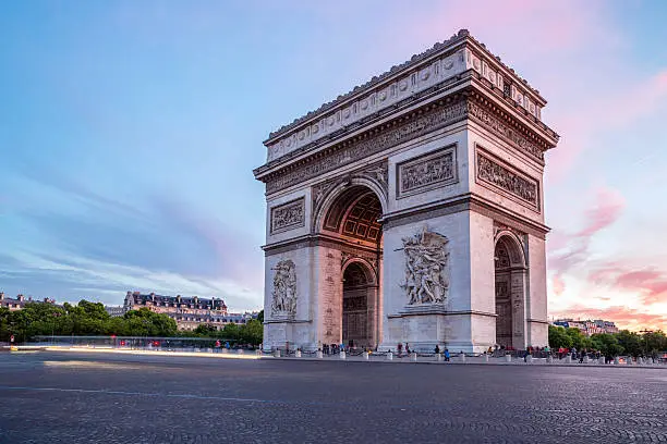 Arc of Triomphe Champs Elysees Paris city at sunset