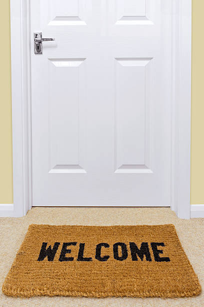istock Welcome doormat outside a door. 503176355