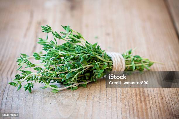 Bunch Of Fresh Thyme On A Wooden Background Stock Photo - Download Image Now - Agriculture, Basil, Bouquet