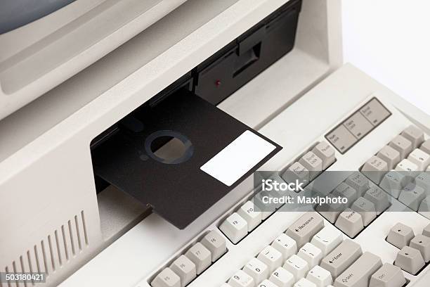 Old Floppy Disk Drive Into Vintage Eigthies Computer Stock Photo - Download Image Now