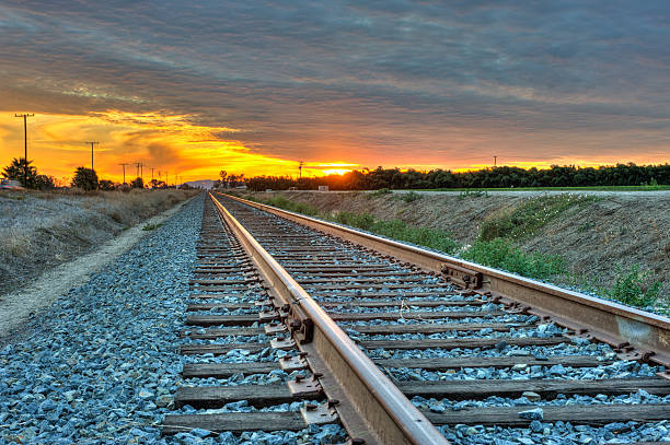 istock Railroad track and sunset meet on the left. 503187252