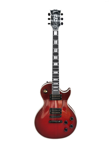 Bright red electric guitar, as used in just about every modern musical style, including rock and roll, blues, country music, hard rock, heavy metal and even jazz.
