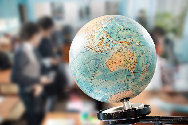 the globe during geography class globe against the background of a school class physical geography stock pictures, royalty-free photos & images
