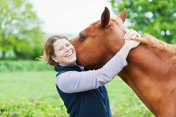 istock Female veterinarian with her horse 503189877