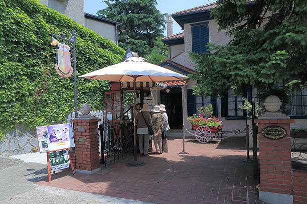 Kobe Japan - 2 June, 2014: Tourists buy tickets for historical Oranda-kan in Ijinkan Kitano district in Kobe Japan.