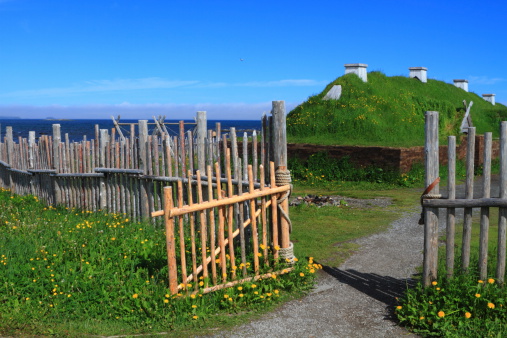 Ancient homes of Viking settlers in L'Anse aux Meadows national historic site on the island of Newfoundland, Canada