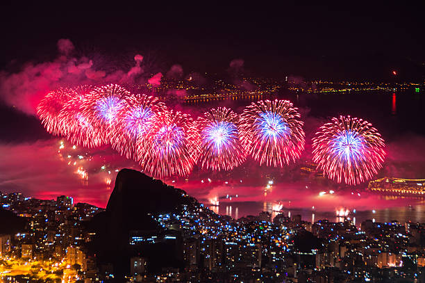 New Year Fireworks in Copacabana Rio de Janeiro, Brazil - December 31, 2015: Worlds famous New Year firework show at Copacabana Beach. copacabana rio de janeiro photos stock pictures, royalty-free photos & images