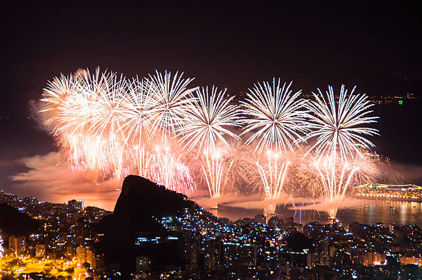 New Year Fireworks in Copacabana Rio de Janeiro, Brazil - December 31, 2015: Worlds famous New Year firework show at Copacabana Beach. copacabana rio de janeiro photos stock pictures, royalty-free photos & images
