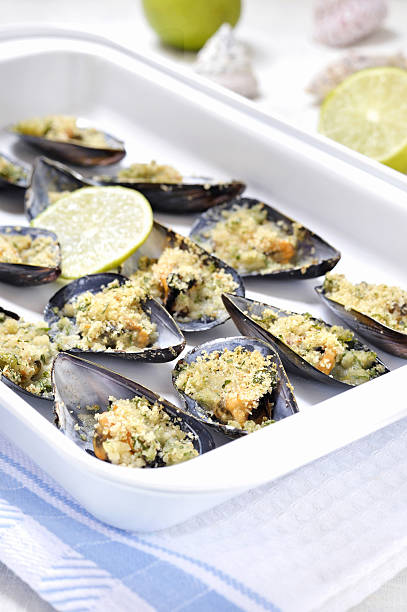 Gratin of Mussels, selective focus. Italian cuisine. stock photo