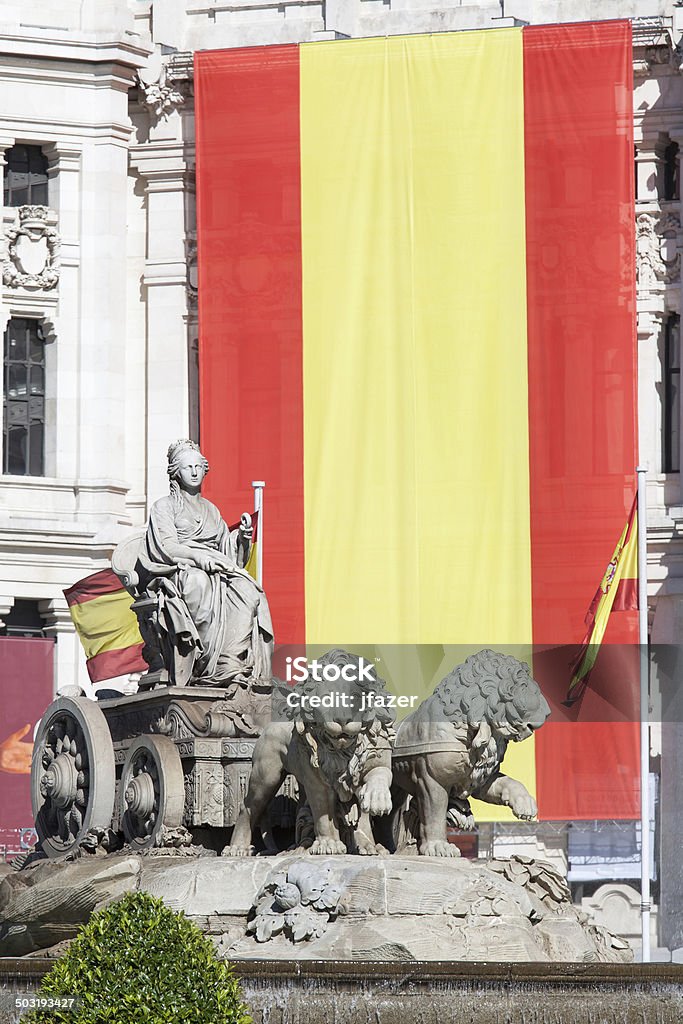 Cibeles square, Madrid, Spain Cibeles square in Madrid, with spanish flags Built Structure Stock Photo