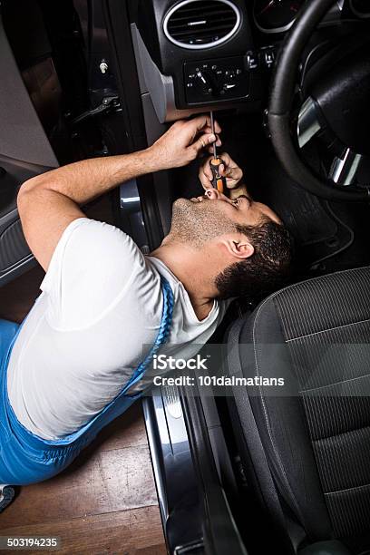 Young Mechanic Fixing Car At Auto Repair Shop Stock Photo - Download Image Now - 30-39 Years, Adult, Adults Only