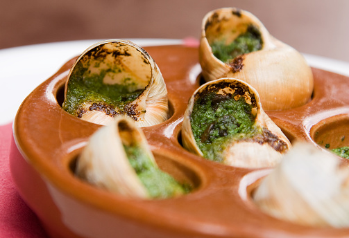 Close-Up Photo of Escargot Served in a Fancy Restaurant Setting