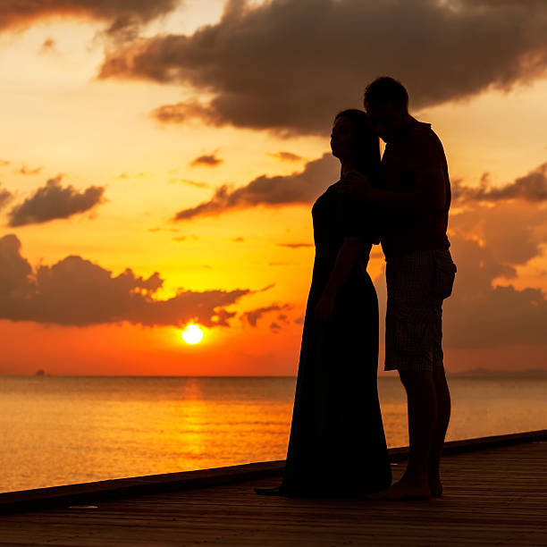 istock silhouette couple in love 503196574