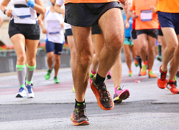 istock people running marathon in the city 503198826