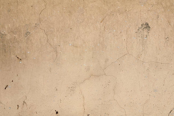 istock Texture of old  wall with yellow stucco 503203903