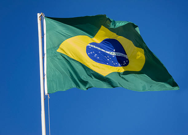 istock Brazilian Flag on a blue sky. 503204915