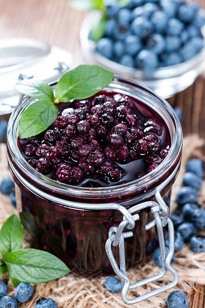 istock Glass with canned Blueberries 503206225