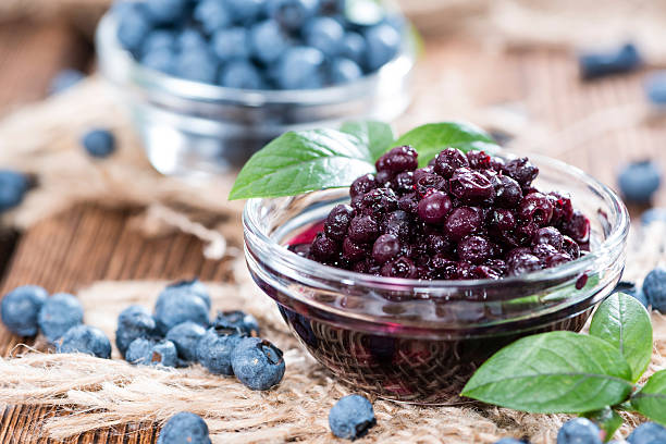 istock Glass with canned Blueberries 503206259
