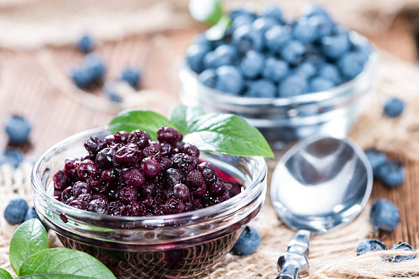 istock Glass with canned Blueberries 503206269