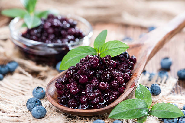 istock Wooden Spoon with canned Blueberries 503206285