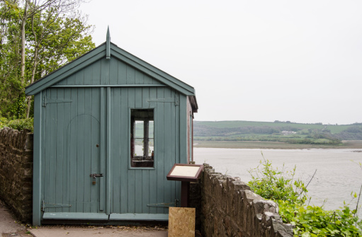 The small wooden shed on the cliffs at Laugharne, overlooking the River Taf estuary used by the famous Welsh poet and playwright Dylan Thomas.  Now preserved as a public monument.