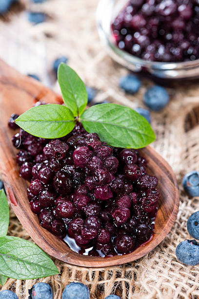 istock Wooden Spoon with canned Blueberries 503207159