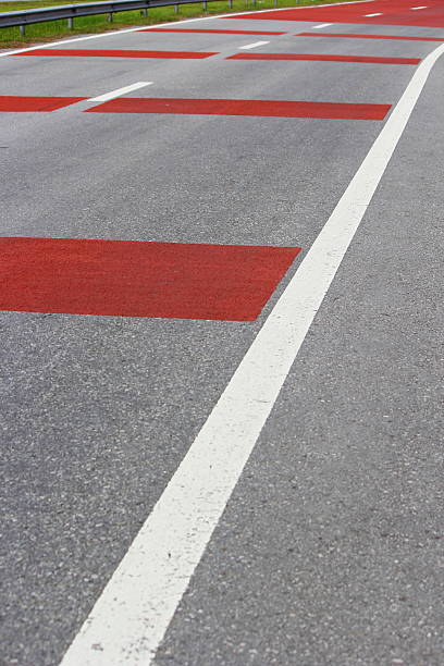 istock Road with white and red lines 503208481